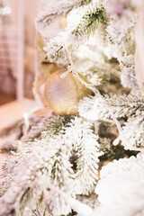 Christmas tree decorated with gold balls