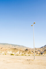 lamppost in the middle of the desert