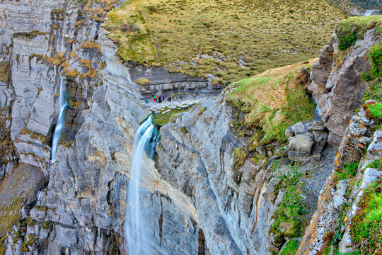 People rappelling 'Salto del Nervion' waterfall. Burg  Alava, Bizkaia.