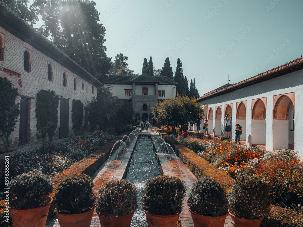 Wall mural General view of The Generalife courtyard, with its famous fountain and garden. Alhambra  Granada