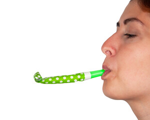 Girl with party whistle noismaker isolated on the white