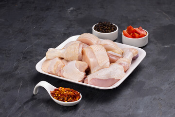 Raw chicken tender curry cut with skin