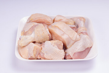 Raw chicken tender curry cut with skin