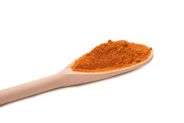 Paprica on wooden spoon isolated.