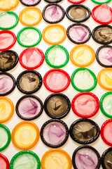 Colorful condoms background.
