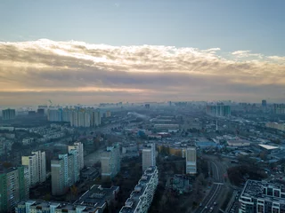 Poster Aerial drone flight over Kiev, haze over the city. Autumn morning. © Sergey