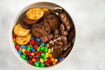 Chocolate candy on the white background, colorful candy texture.