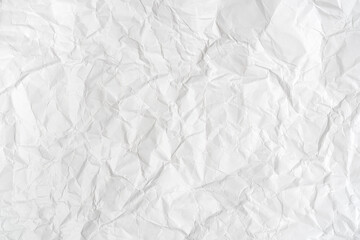 White sheet of crumpled paper for background with fine texture.