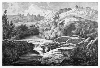Fototapeta na wymiar little man searching gold in a little torrent on a huge natural landscape in Nacaye, Mexico. Ancient grey tone etching style art by Sargent and Rond�, Le Tour du Monde, 1861