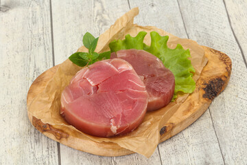 Raw tuna round steak for grill
