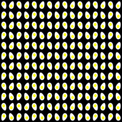 Figures in the form of an egg cut in half with a yellow yolk on a black background. The arrangement of the figures is symmetrical and in a row.
