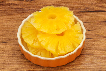 Marinated pineapple rings in the bowl