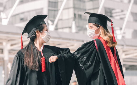 Two Asian Women Wearing Mask On Graduation Day
