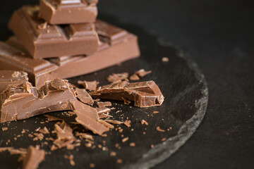 homemade cookies with chocolate on a dark background.