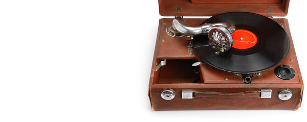 Old gramophone with plate or vinyl disk on wooden box isolated on white background. Free space for text. Wide photo.