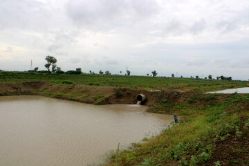 Farm pits that collect rainwater.