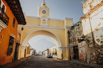 Fototapeta na wymiar Santa Catalina Arch in Antigua Guatemala empty streets during COVID-19 pandemic
