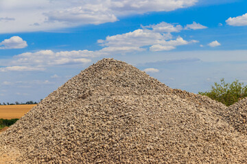 Fototapeta na wymiar Piles of gravel for road construction