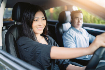 Asian couple traveling holiday vacation road trip nature forest mountain tracking, inside car...