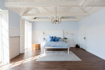Nice cozy interior of a spacious room in gentle blue tones