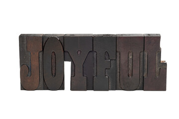 The word JOYFUL spelled out wilt vintage letterpress type isolated on a white background