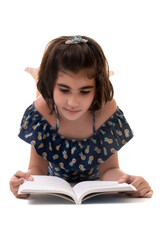Hispanic small girl reading a book - Isolated on a white background