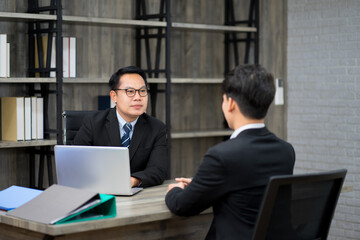 businessman wearing formal suit interviewing new candidate for new employment position in the financial office. new normal work from home concept. 