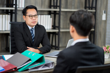 businessman wearing formal suit interviewing new candidate for new employment position in the financial office. new normal work from home concept. 