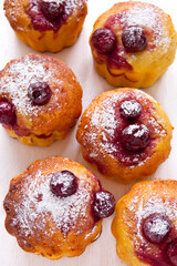 Homemade Cherry Muffins on a white background