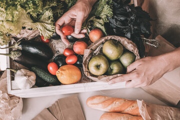 shop with vegetables and fruits where they are Packed in a paper bag. The theme of ecology
