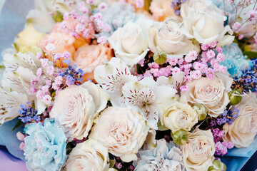 beautiful bouquet of different plants rose hypsophila Alstroemeria. the theme of floral business and shop .