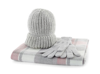 Woolen gloves, hat and scarf on white background. Winter clothes