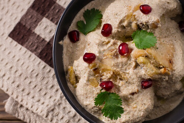 Traditional Georgian satsivi with chicken, nuts and pomegranate