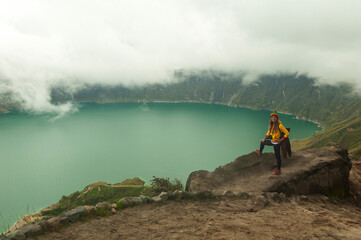 Obraz premium Incredible landscape of a lagoon inside a crater called Quilotoa, a tourist photographers. South American Landscape, Ecuador
