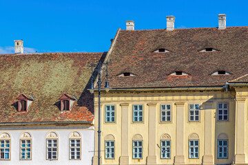 Fototapeta na wymiar Roofs with windows like eyes, Sibiu, Transylvania, Romania