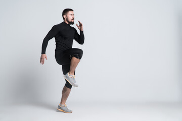 sport man or bodybuilder exercising on white background