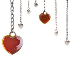half frame from red and steel hearts and long chains on white