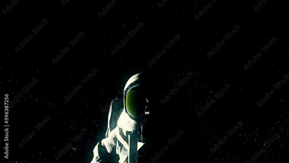 Wall mural lone astronaut floating in space, reflection of asteroid and earth in his helmet. space and universe