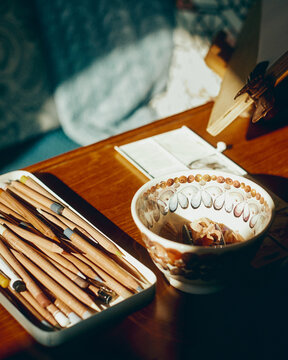 artist's materials and workspace in yacht