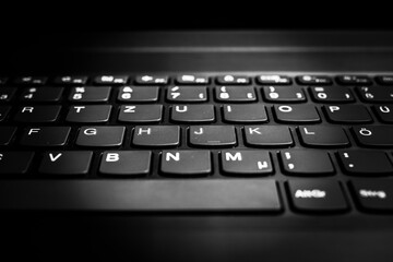 Close up of black gray laptop keyboard