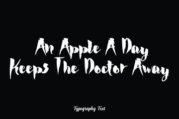 An Apple A Day Keeps The Doctor Away Handwritten Bold Typography White Color Text On Black Background