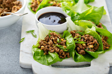 Chicken or turkey asian lettuce wraps with sweet and spicy sauce