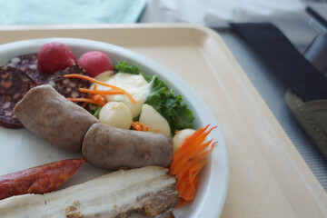 ,  - Jan 01, 1970: Closeup shot of a plate with blood and liver sausages meat dinner
