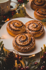 Obraz na płótnie Canvas Cinnamon rolls with sugar for Christmas