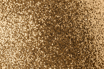Gold glittering background. The basis for Christmas layouts.