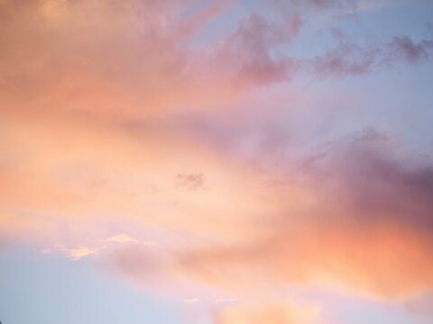 Pink clouds in sky at sunset. © Andrei