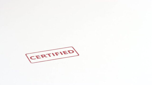 CERTIFIED red rubber stamp on the paper