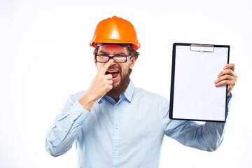 Business man construction hard hat with professional industry documents