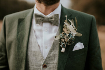 man or groom in suit on a wedding