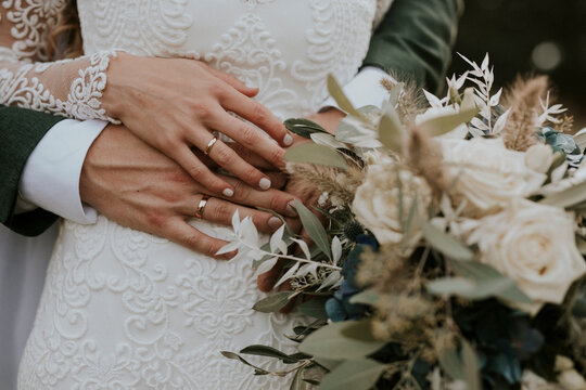 hands of bride and groom on a wedding